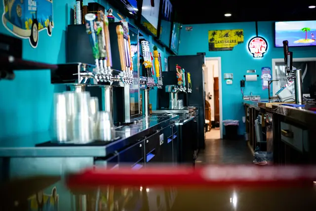 Close-up of the draft tap tower behind the bar