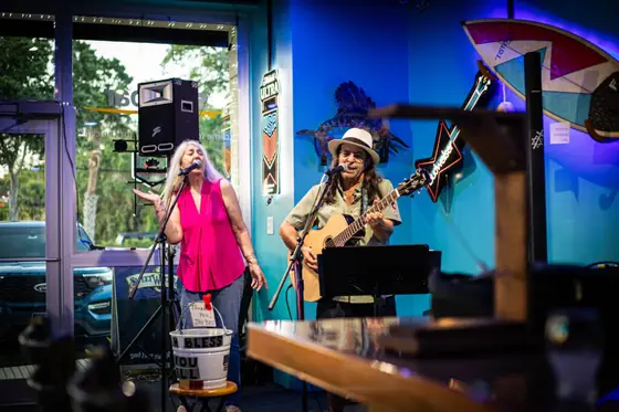 Musicians playing a set inside Sandbar